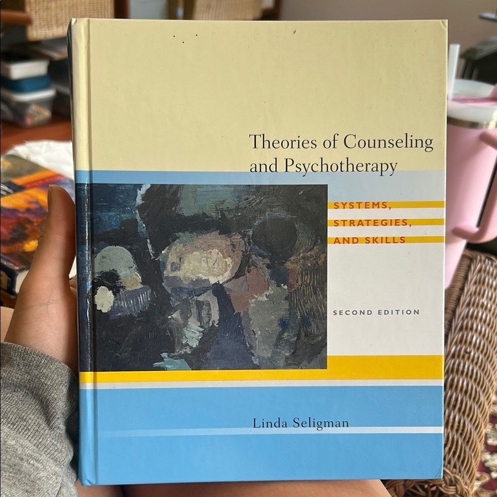 Theories of Counseling and Psychotherapy Book - Blue and Yellow Cover